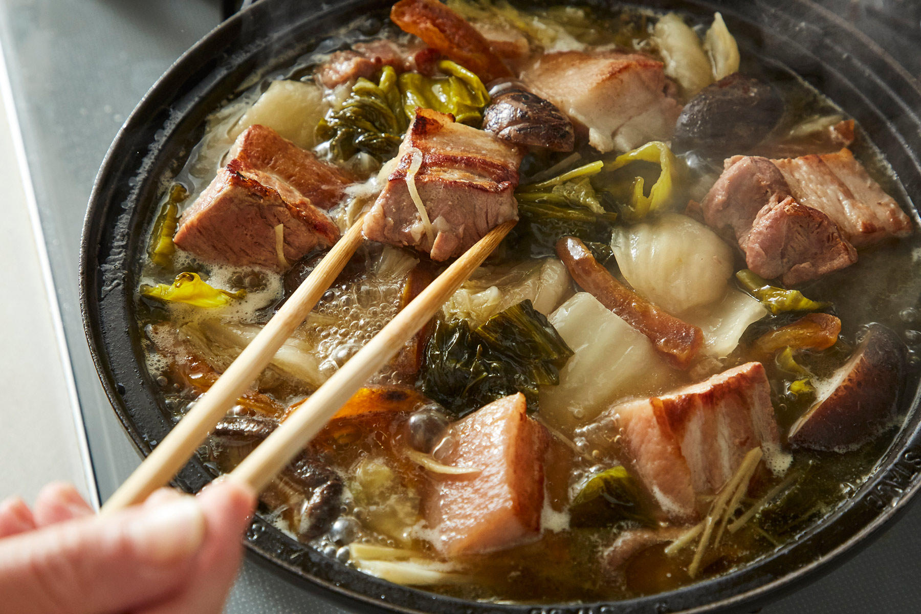 豚と漬物の煮込み