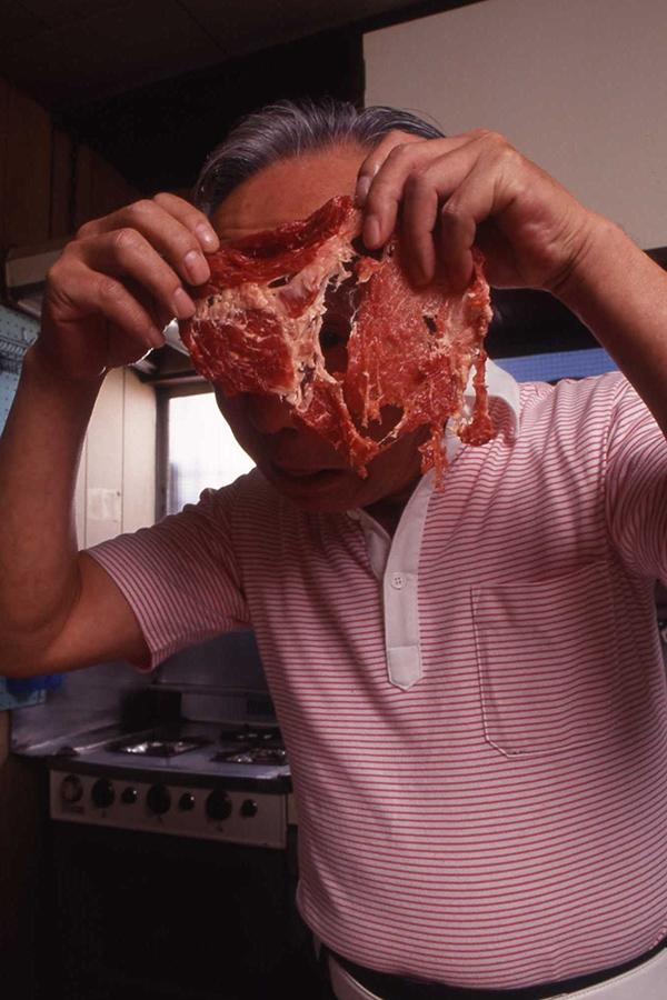 料理をつくる金馬師匠