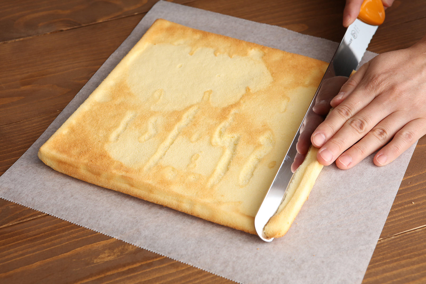 生地から敷紙を剥がす