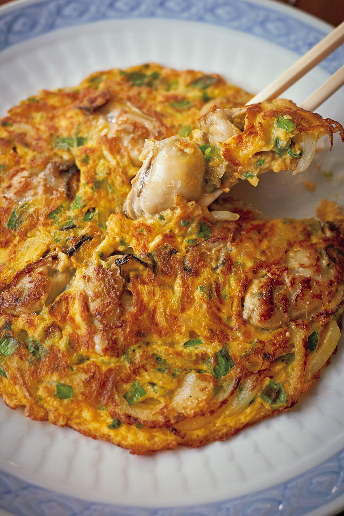 牡蠣と卵の蜆醤炒め