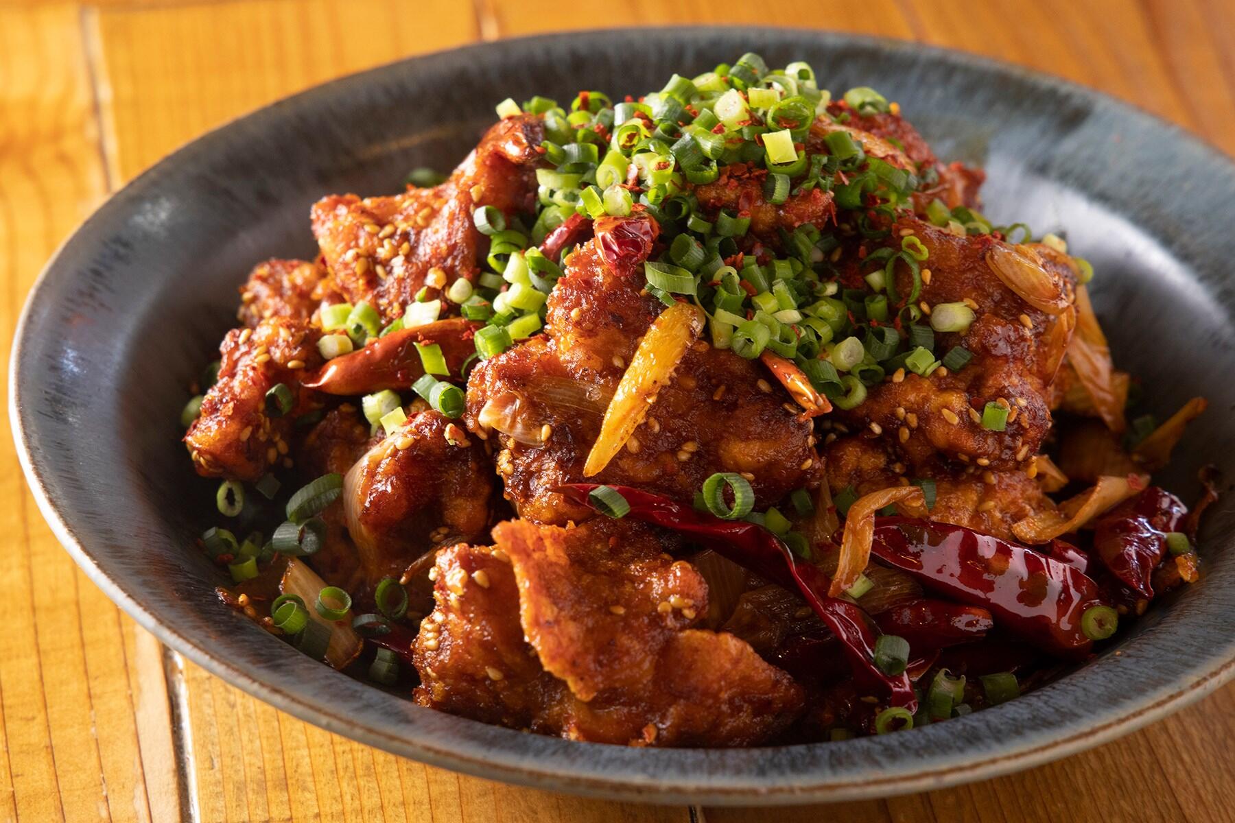 鶏唐揚げの豆板醤炒め