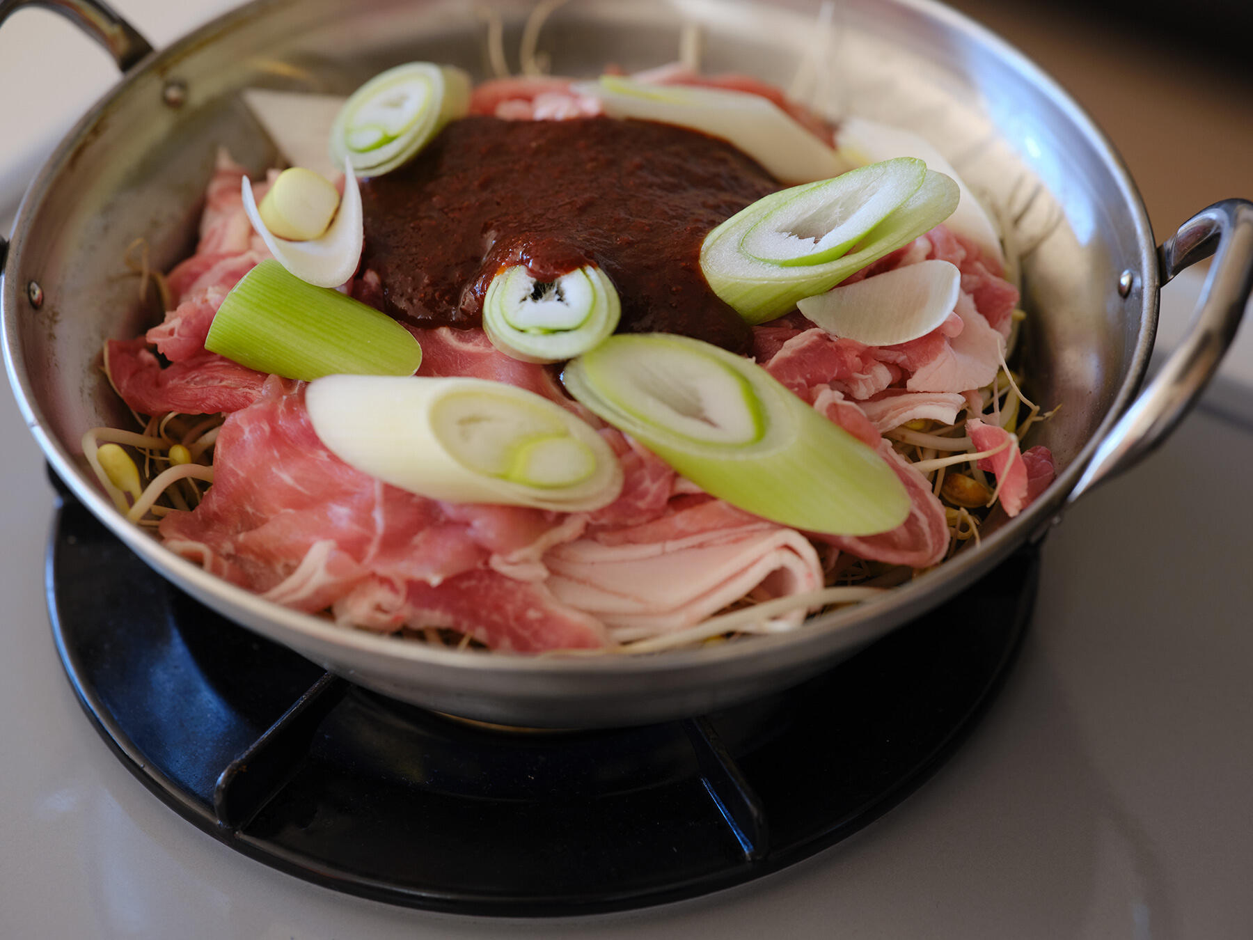 蒸し焼きにする